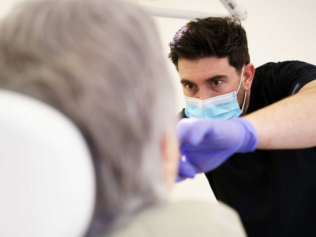 Pete Livesey Pete adjusting denture details at Skipton Road Dental Practice in Colne. Expert denture care in Colne, Lancashire.