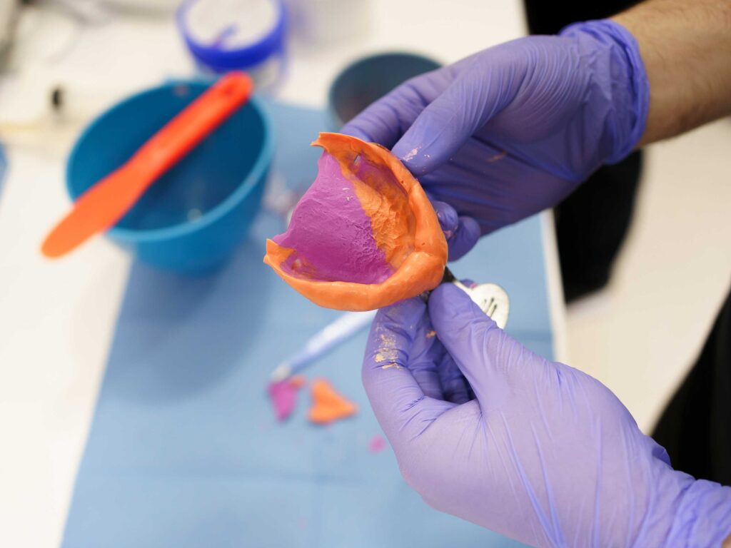 Pete Livesey Pete explaining denture fitting at Skipton Road Dental Practice in Pendle. Expert denture care in Pendle, Lancashire.