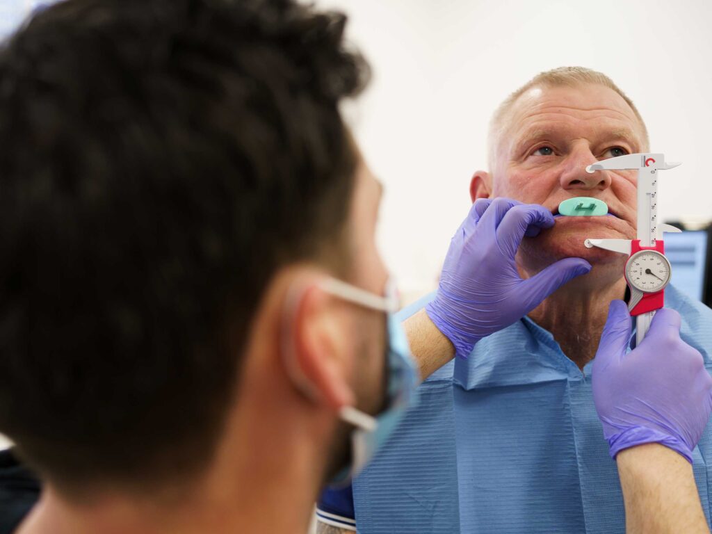 Pete Livesey pete measuring mouth ready for fit at Skipton Road Dental Practice in . Expert denture care in, Lancashire.